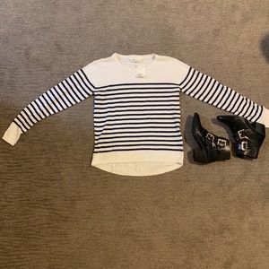 White H&M sweater with black stripes.